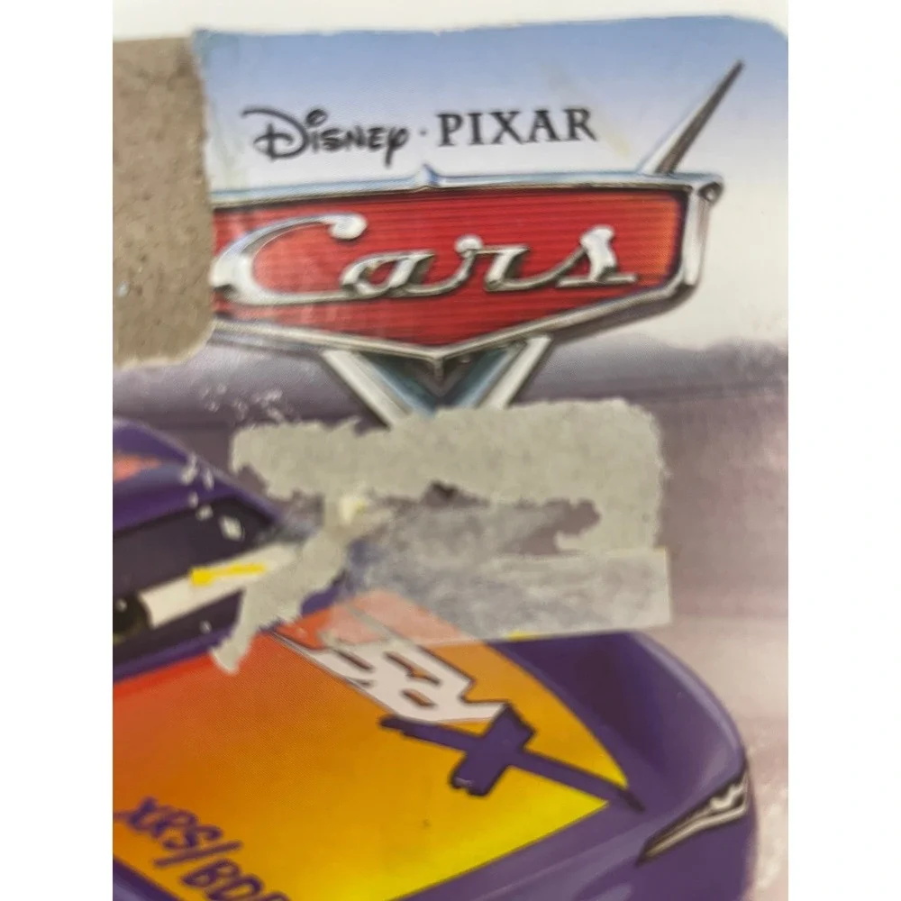 Disney Pixar Cars XRS Rocket Racing Barry DePedal Purple Orange Mattel GKB91